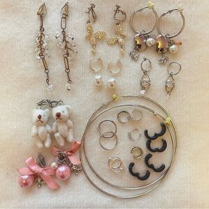 10 pairs of clip on earrings and 8 clip on ear cuffs!
